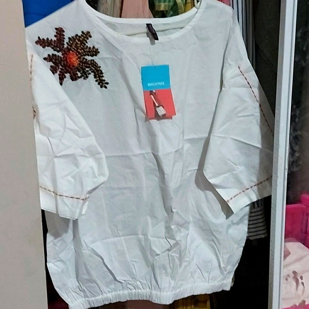 New white top with embroidery